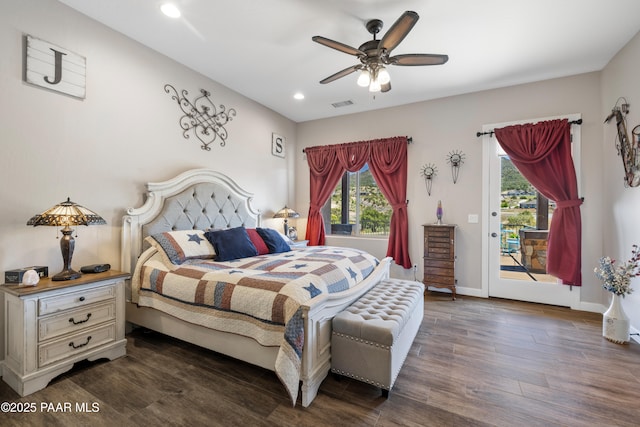 bedroom with dark wood finished floors, recessed lighting, visible vents, access to outside, and baseboards