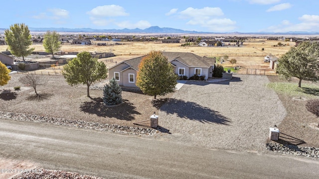 aerial view with a mountain view and a rural view
