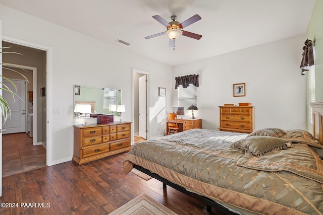 bedroom with ceiling fan, visible vents, baseboards, and dark wood finished floors