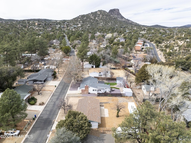 birds eye view of property with a mountain view