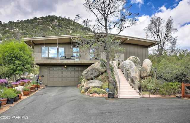 2009 Rocky Dells Dr, Prescott, AZ 86303 - view of front facade with driveway, a garage, and stairs