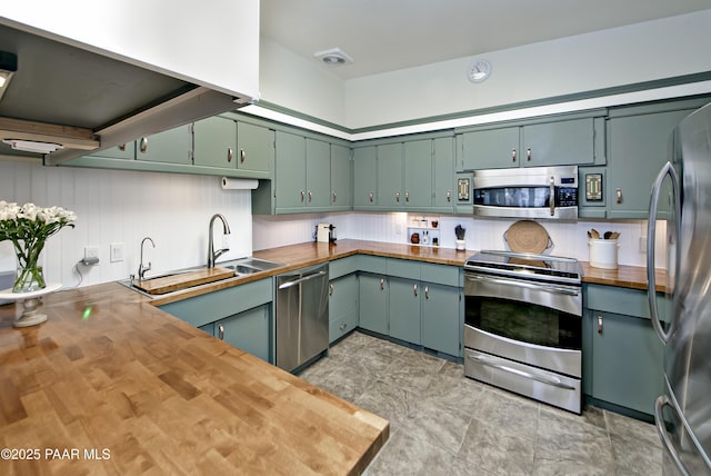 2009 Rocky Dells Dr, Prescott, AZ 86303 - kitchen with appliances with stainless steel finishes and butcher block countertops
