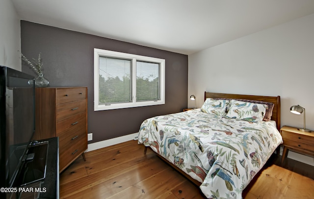 2009 Rocky Dells Dr, Prescott, AZ 86303 - bedroom with baseboards and wood-type flooring