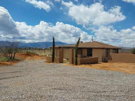 exterior space featuring a mountain view