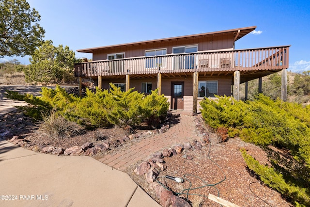 view of front of property featuring a deck