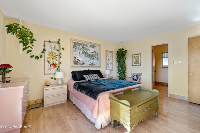 bedroom with light hardwood / wood-style floors