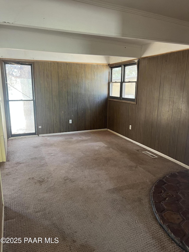 4860 Diamond Dr, Prescott, AZ 86301 - carpeted empty room with wooden walls and baseboards