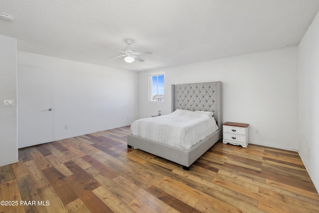 8910 S Steven Trl, Kirkland, AZ 86332 - bedroom featuring hardwood / wood-style floors and ceiling fan