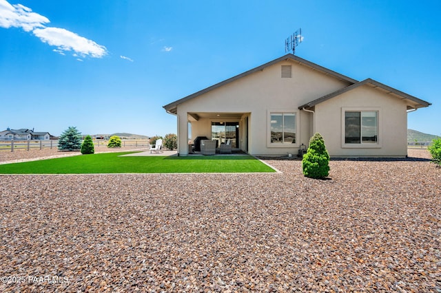 12612 E E Side Saddle Ln, Prescott Valley, AZ 86315 - rear view of property featuring stucco siding and a patio