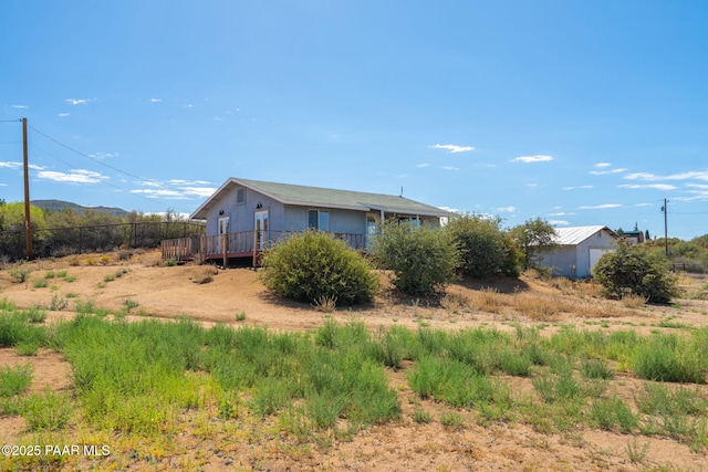 7555 W Wexford Dr, Wilhoit, AZ 86332 - view of property exterior with a wooden deck
