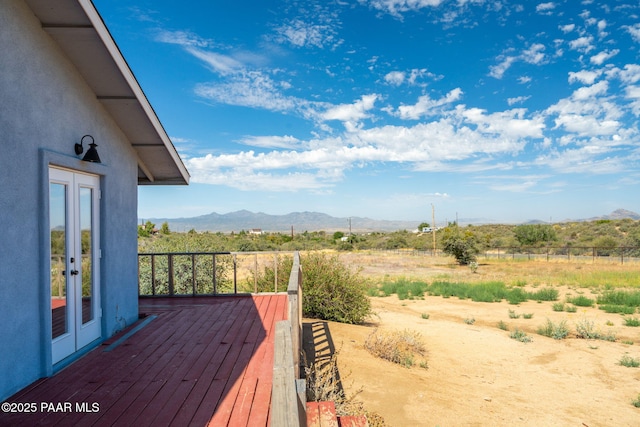 7555 W Wexford Dr, Wilhoit, AZ 86332 - wooden terrace featuring a mountain view, french doors, and a view of rural / pastoral area
