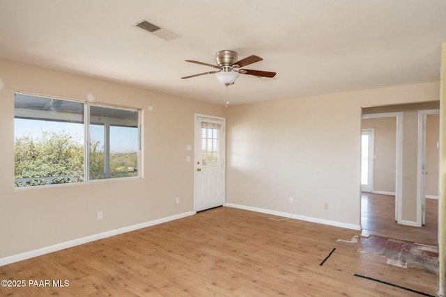 7555 W Wexford Dr, Wilhoit, AZ 86332 - spare room with a ceiling fan and wood finished floors