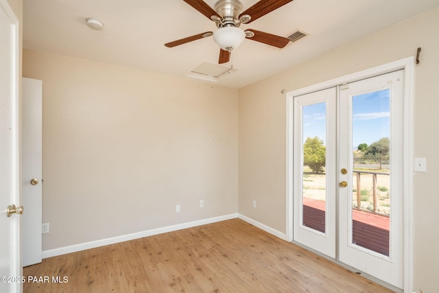 7555 W Wexford Dr, Wilhoit, AZ 86332 - spare room with french doors, light wood finished floors, a smoke detector, and ceiling fan