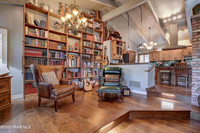 sitting room with high vaulted ceiling, a notable chandelier, visible vents, beam ceiling, and hardwood / wood-style floors