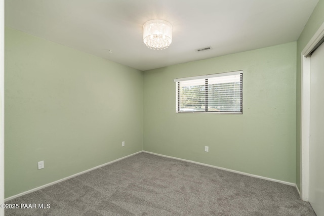3045 Hozoni Rd, Prescott, AZ 86305 - carpeted spare room with a chandelier and baseboards