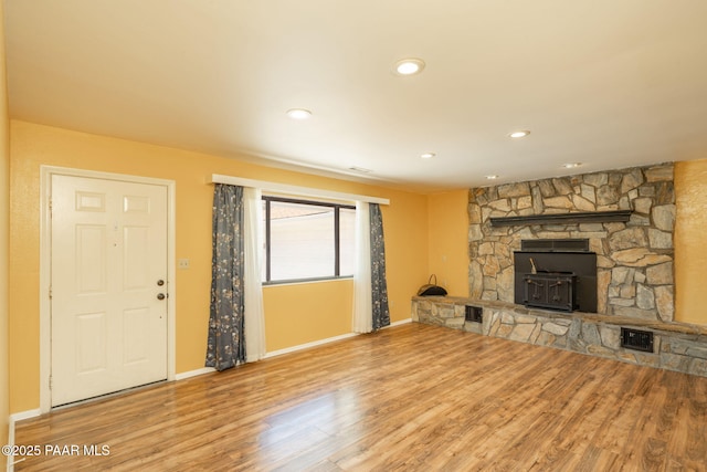 3045 Hozoni Rd, Prescott, AZ 86305 - unfurnished living room with wood finished floors, baseboards, and recessed lighting