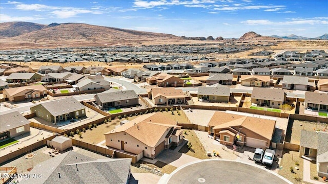 birds eye view of property featuring a mountain view and a residential view