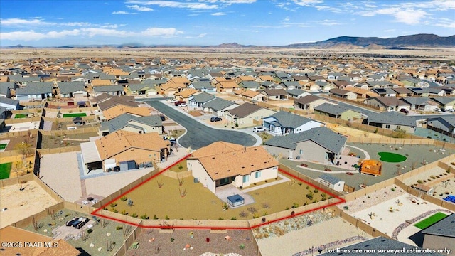 bird's eye view with a mountain view and a residential view