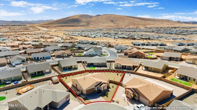 aerial view with a mountain view and a residential view