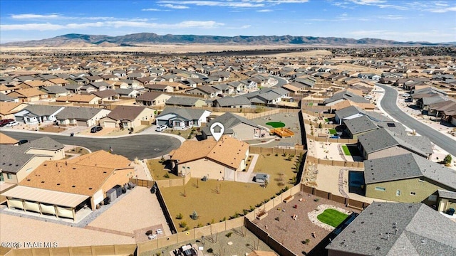 bird's eye view with a residential view and a mountain view