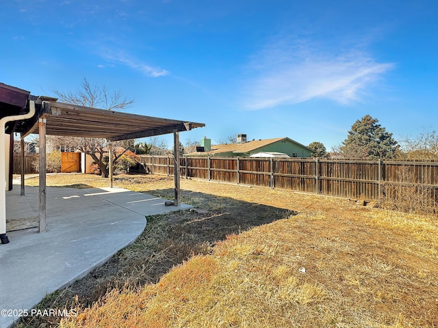 view of yard featuring a patio area and a fenced backyard