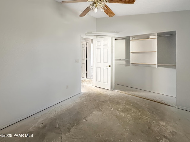 unfurnished bedroom featuring a closet, concrete floors, and ceiling fan