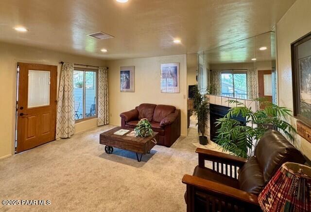 3169 Dome Rock Pl Unit 12A, Prescott, AZ 86301 - carpeted living area with plenty of natural light and recessed lighting