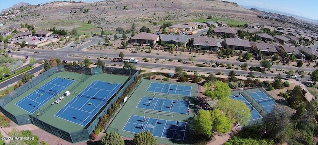 birds eye view of property featuring a mountain view