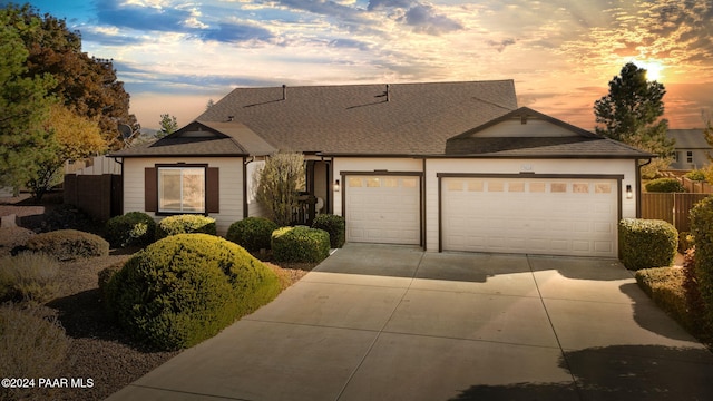 view of front of property with a garage