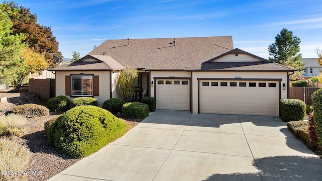 ranch-style house featuring a garage