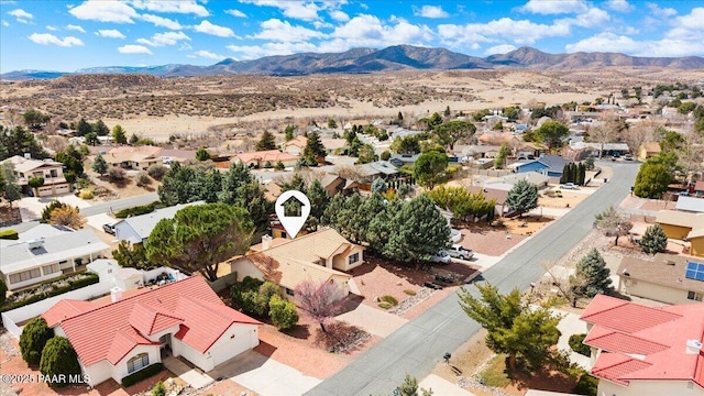 drone / aerial view with a mountain view and a residential view
