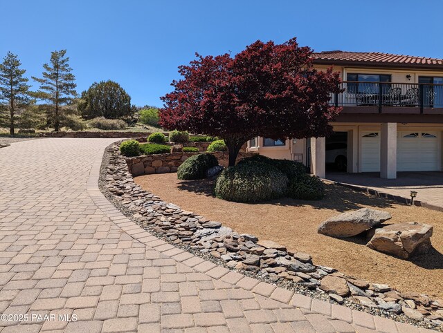 2751 Boone Ct, Prescott, AZ 86305 - view of front of home with decorative driveway, an attached garage, and stucco siding