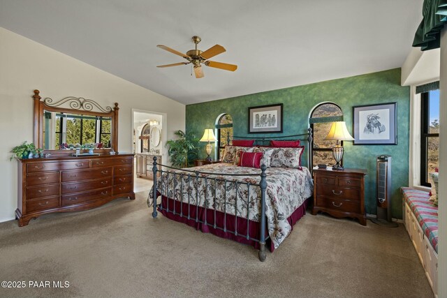 2751 Boone Ct, Prescott, AZ 86305 - bedroom with vaulted ceiling, multiple windows, carpet flooring, ceiling fan, and ensuite bathroom