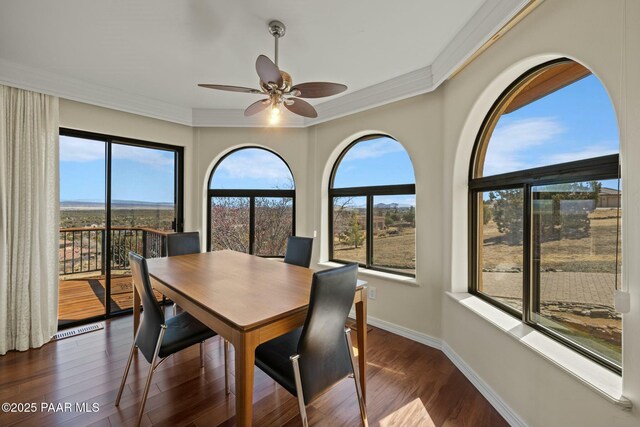 2751 Boone Ct, Prescott, AZ 86305 - dining room with ceiling fan, crown molding, dark wood-style flooring, and baseboards