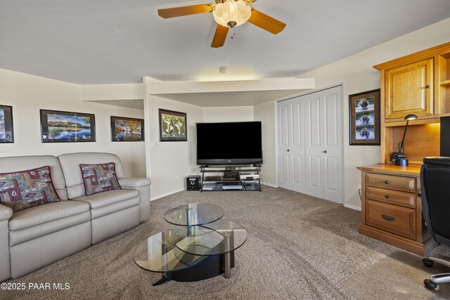 2751 Boone Ct, Prescott, AZ 86305 - carpeted living room with a desk, a ceiling fan, and baseboards