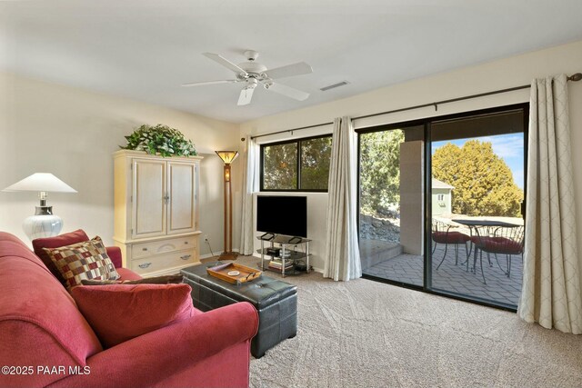 2751 Boone Ct, Prescott, AZ 86305 - carpeted living room with ceiling fan and baseboards