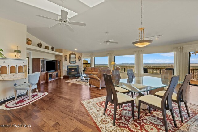 2751 Boone Ct, Prescott, AZ 86305 - dining space with a ceiling fan, wood finished floors, and vaulted ceiling