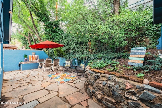 view of patio with outdoor dining space