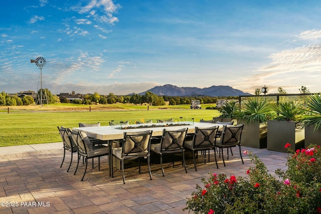 view of patio / terrace with a mountain view and an outdoor bar