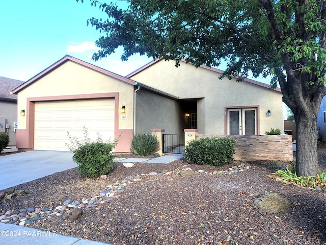 ranch-style home with a garage