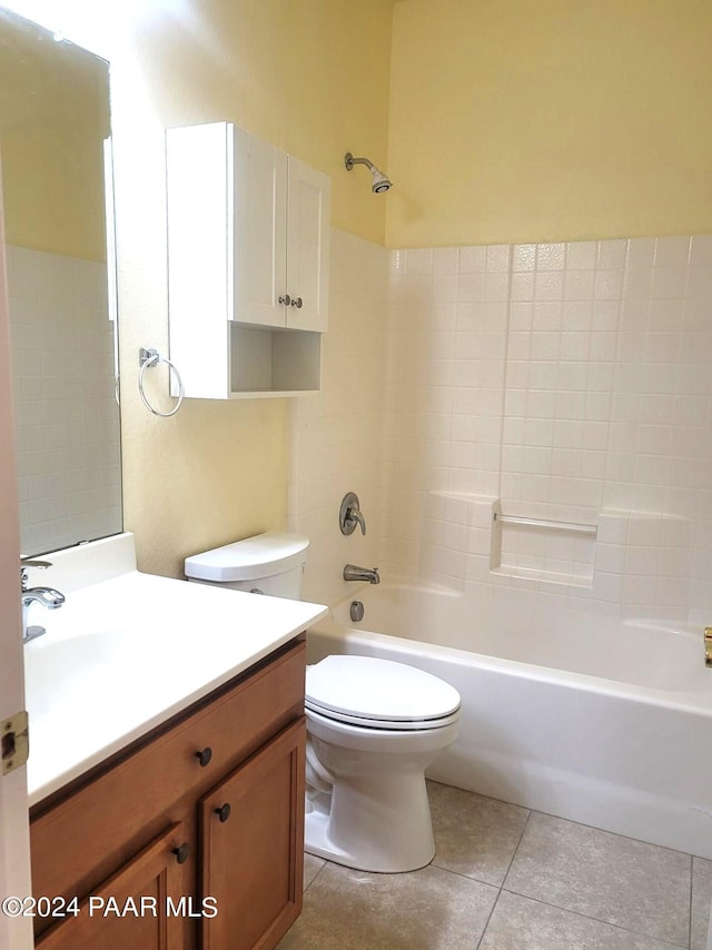 full bathroom featuring tile patterned flooring, vanity, toilet, and tub / shower combination