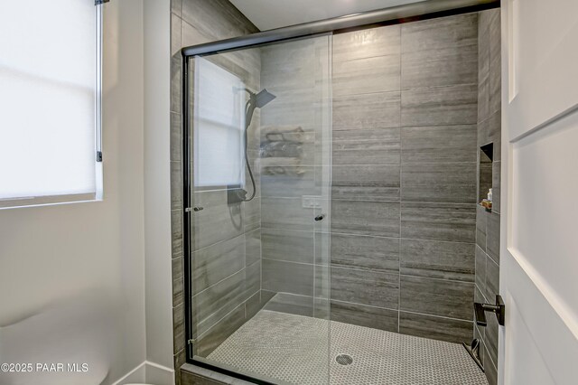 bedroom featuring visible vents, dark wood-style flooring, ceiling fan, and baseboards