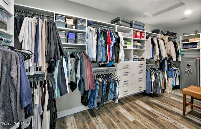 spacious closet with visible vents and wood finished floors