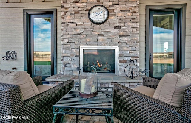 exterior space featuring an outdoor stone fireplace