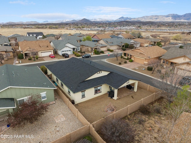 bird's eye view featuring a residential view and a mountain view