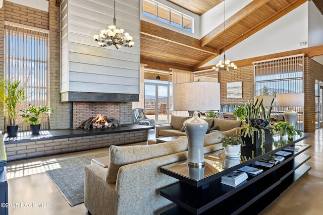 living area featuring a fireplace, high vaulted ceiling, wooden ceiling, and a chandelier