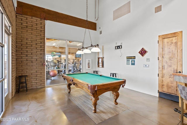 game room with billiards, visible vents, concrete floors, and a healthy amount of sunlight