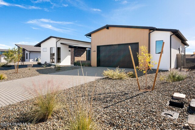 view of front of home with a garage