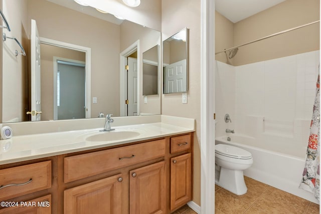 full bathroom with tile patterned flooring, shower / bath combination with curtain, vanity, and toilet