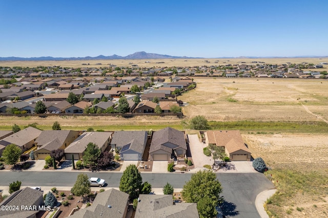 drone / aerial view featuring a mountain view